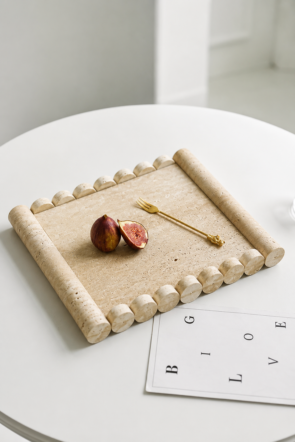 Hand-carved fluted travertine tray with ribbed edge