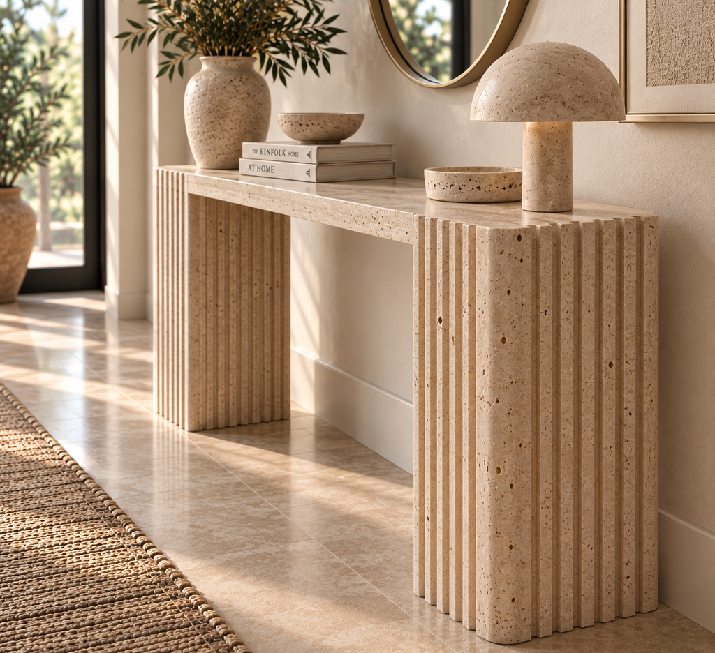 Hand-carved travertine console table with asymmetric slab and fluted leg