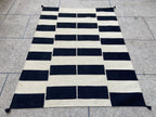 Black and ivory geometric handwoven wool kilim rug, full view