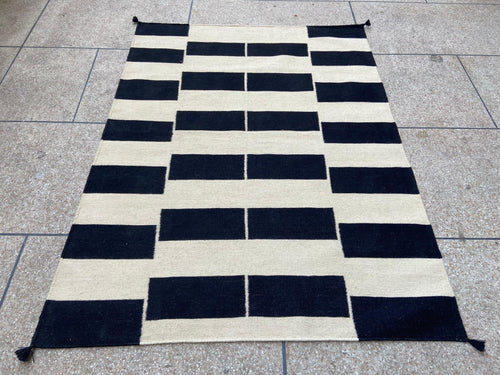 Black and ivory geometric handwoven wool kilim rug, full view