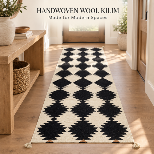 Black and ivory handwoven wool kilim runner in a modern hallway