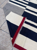 Black ivory and red abstract stripe handmade wool kilim rug