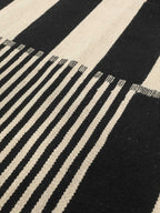 Black and ivory striped modern wool kilim rug, detail 6