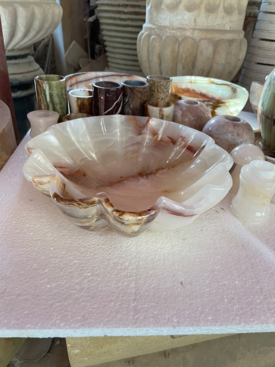 Original photograph of approximately 12 inch scalloped natural stone bowl