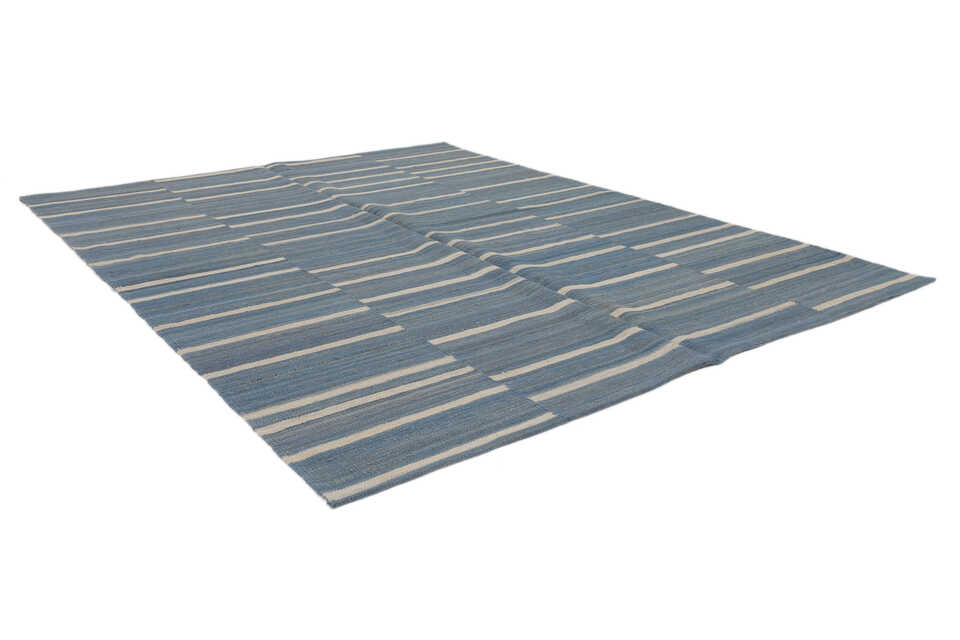 Modern broken-stripe coastal wool rug, perspective view