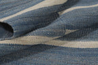 Folded denim blue and ivory reversible wool kilim rug