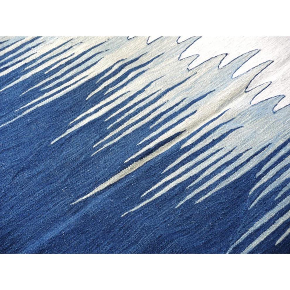 Close-up of indigo blue and ivory flatweave texture