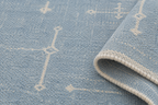 Close-up of light blue and ivory handwoven wool runner texture
