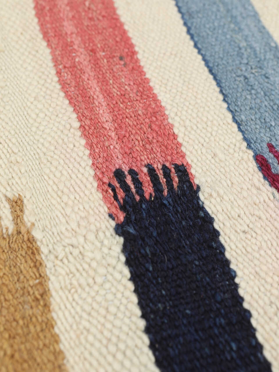 Handwoven texture of colourful Southwestern-style flatweave rug