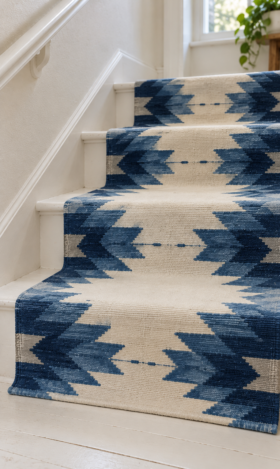 Navy Blue & Ivory geometric wool stair runner on white stairs – closeup view, no fringes