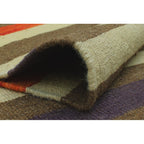 Folded edge showing the reversible wool flatweave construction